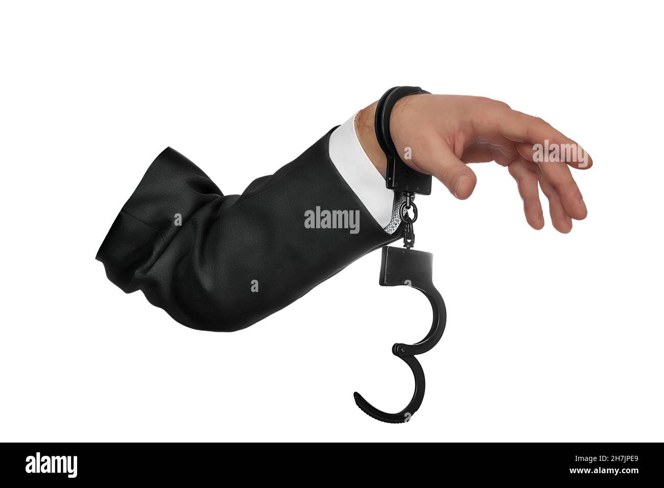 Main d'homme politique ou homme d'affaires aux menottes.Objet isolé sur fond blanc.Concept.Arrestation pour crime.Objet pour collage photo. Banque D'Images