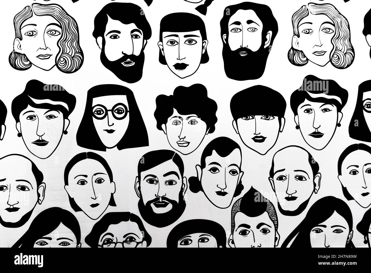 Têtes peintes en noir et blanc Banque D'Images
