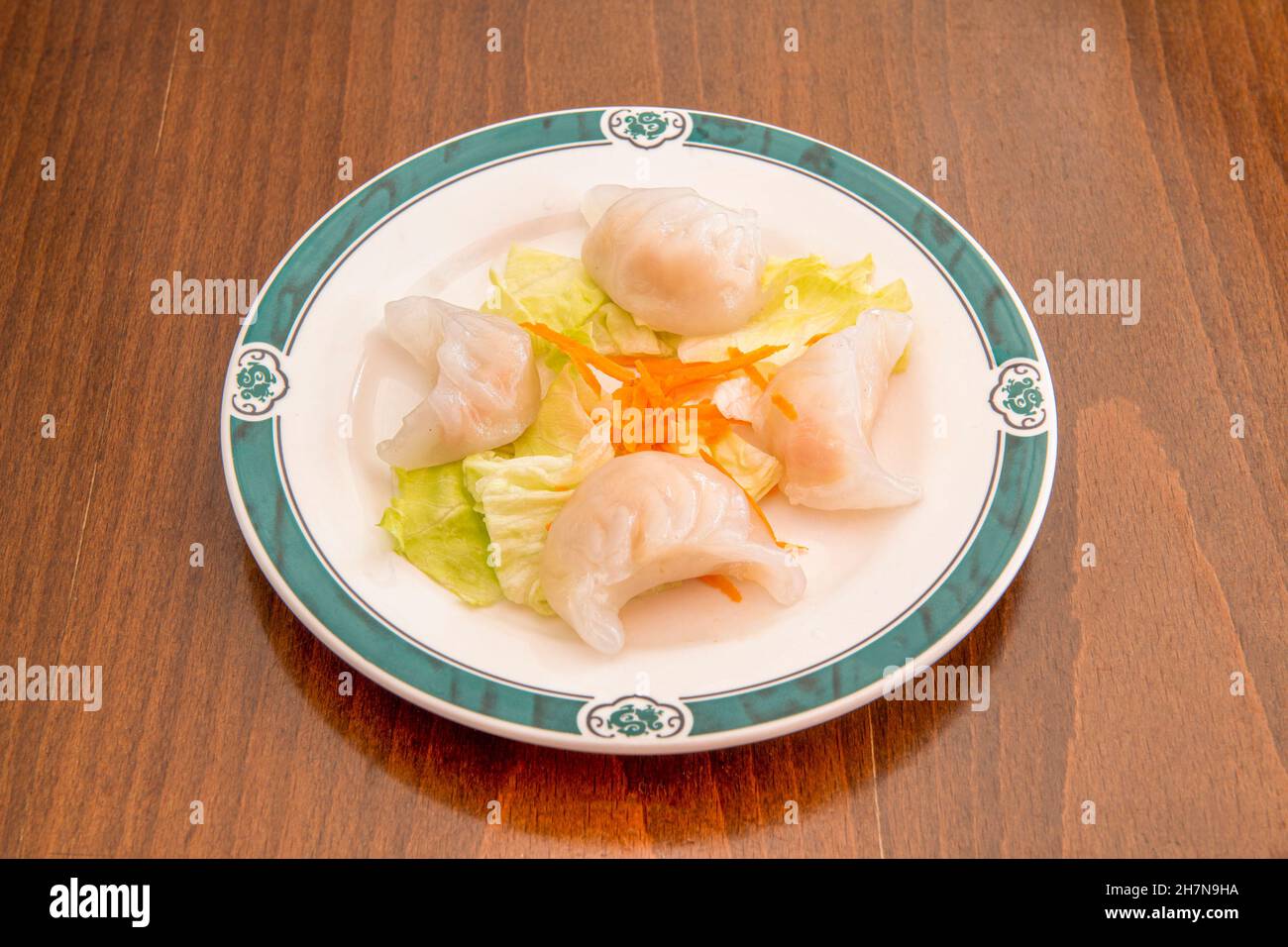 Un jiaozi, également connu sous le nom de mandu, est un type de boulettes ou raviolis typique de la cuisine chinoise très populaire en Chine, au Japon et en Corée, ainsi qu'en outsi Banque D'Images