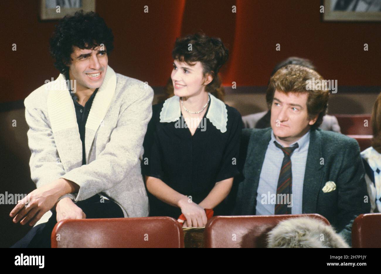 Julien Clerc et Miou-Miou assistant au spectacle de télévision 'la dernière séance', présenté par Eddy Mitchell.1984-1985 Banque D'Images