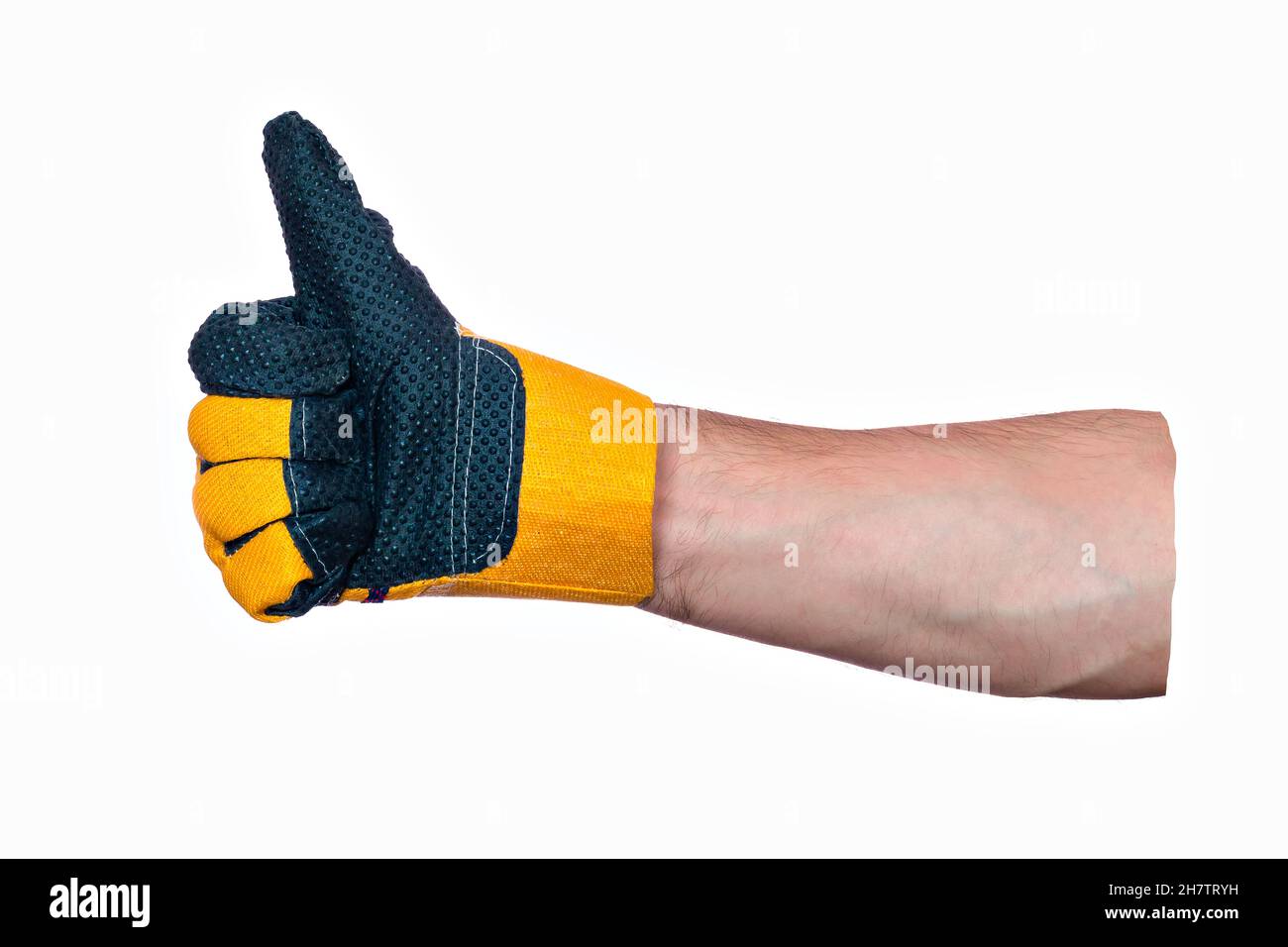 Approbation du mouvement.Bravo.La main de l'homme dans le gant de construction montre que tout est bien.Gros plan.Isolé sur fond blanc.Vierge pour le collage publicitaire.Thème de la construction. Banque D'Images