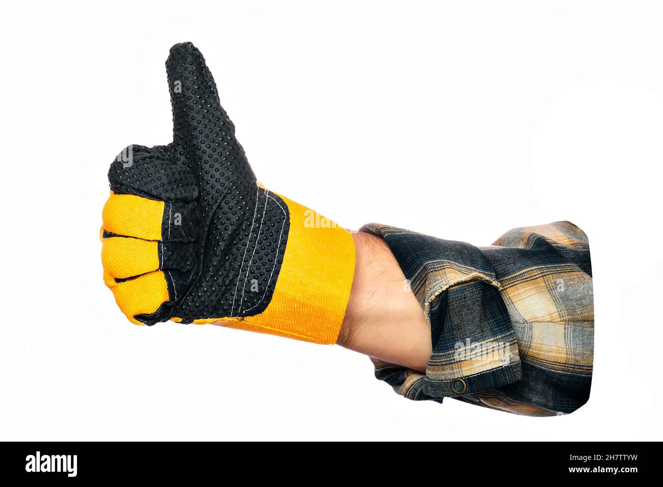 Approbation du mouvement.Bravo.La main de l'homme dans le gant de construction montre que tout est bien.Gros plan.Isolé sur fond blanc.Vierge pour le collage publicitaire.Thème de la construction. Banque D'Images