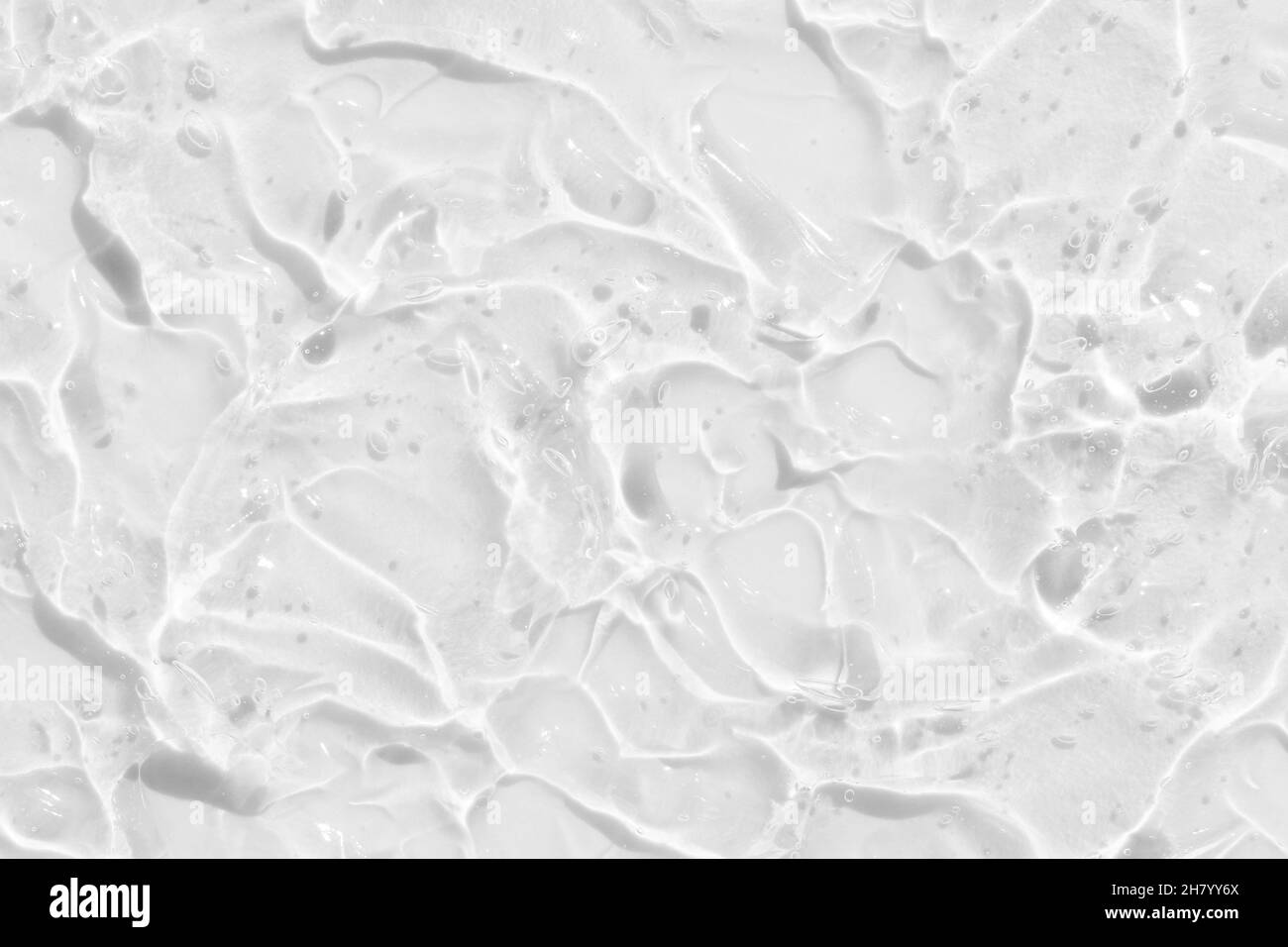 vague d'eau blanche abstraite ou pure texture de bulle naturelle, savon de gel, photographie de fond Banque D'Images