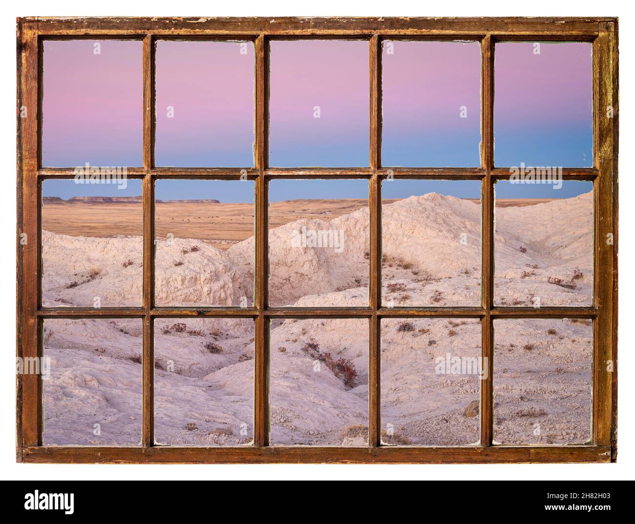 Surgiez les badlands et les prairies du Colorado, vu depuis une fenêtre de guillotine d'époque Banque D'Images