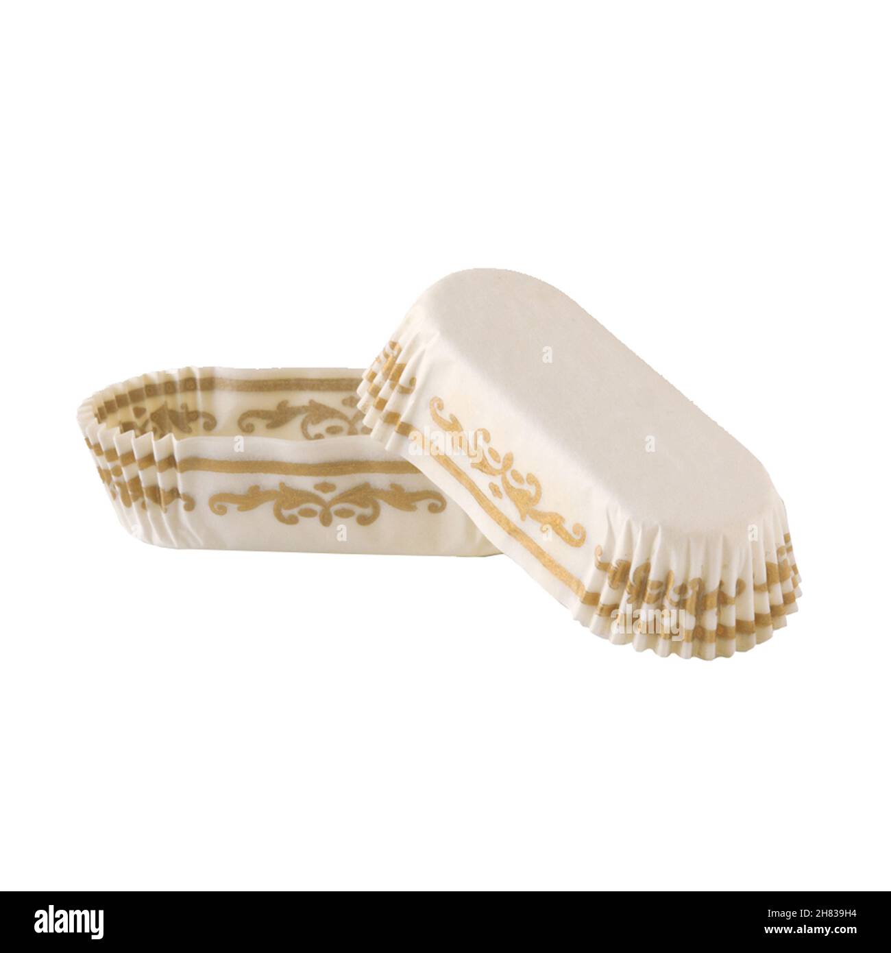 Papier blanc forme de cuisson pour les eclaloires et les gâteaux avec motif doré isolé sur fond blanc Banque D'Images