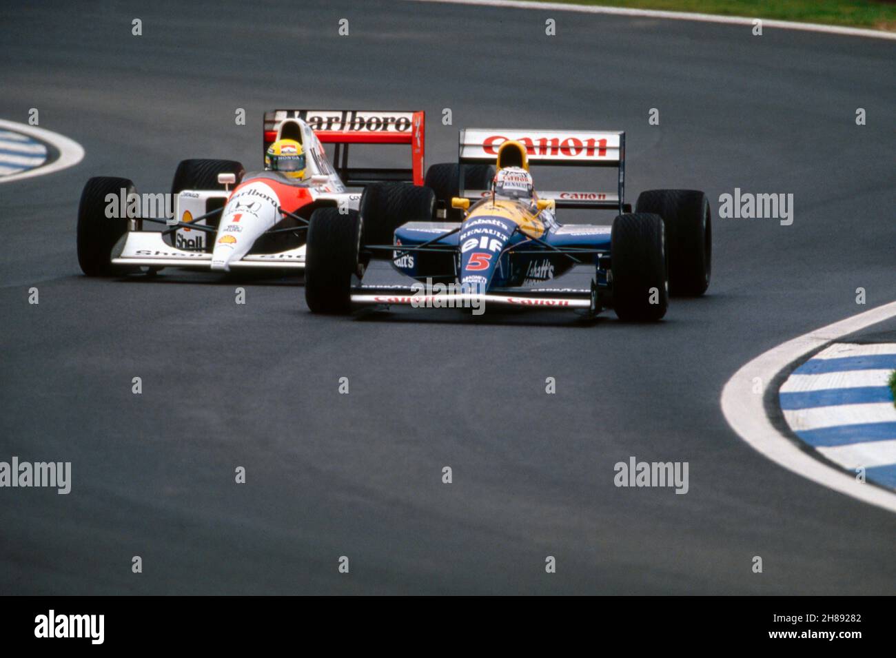 05 Mansell Nigel (gbr), Canon Williams Team, Williams-Renault FW14, 01  Senna Ayrton (BRA), Honda Marlboro McLaren, McLaren-Honda MP4/6, action  lors du Grand Prix d'Espagne 1991 sur le circuit de Barcelone-Catalunya,  14e tour