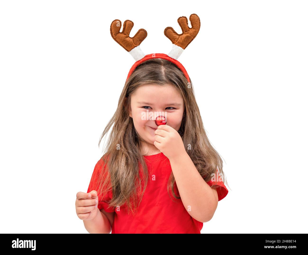 Portrait de Noël d'un enfant avec des bois et le cerf à nez rouge Rudolph Banque D'Images