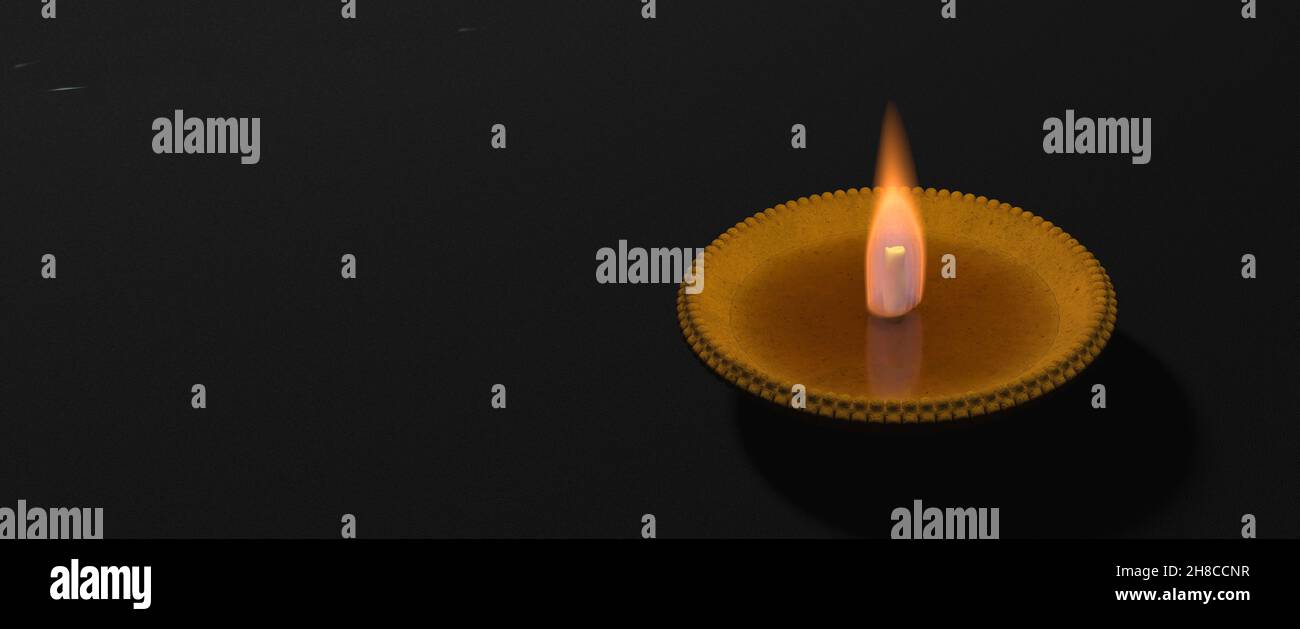 Diwali, festival hindou des lumières.Diya d'argile illuminée dans les vacances de Dipavali, bougie d'huile traditionnelle sur fond sombre, espace, modèle.3 Banque D'Images