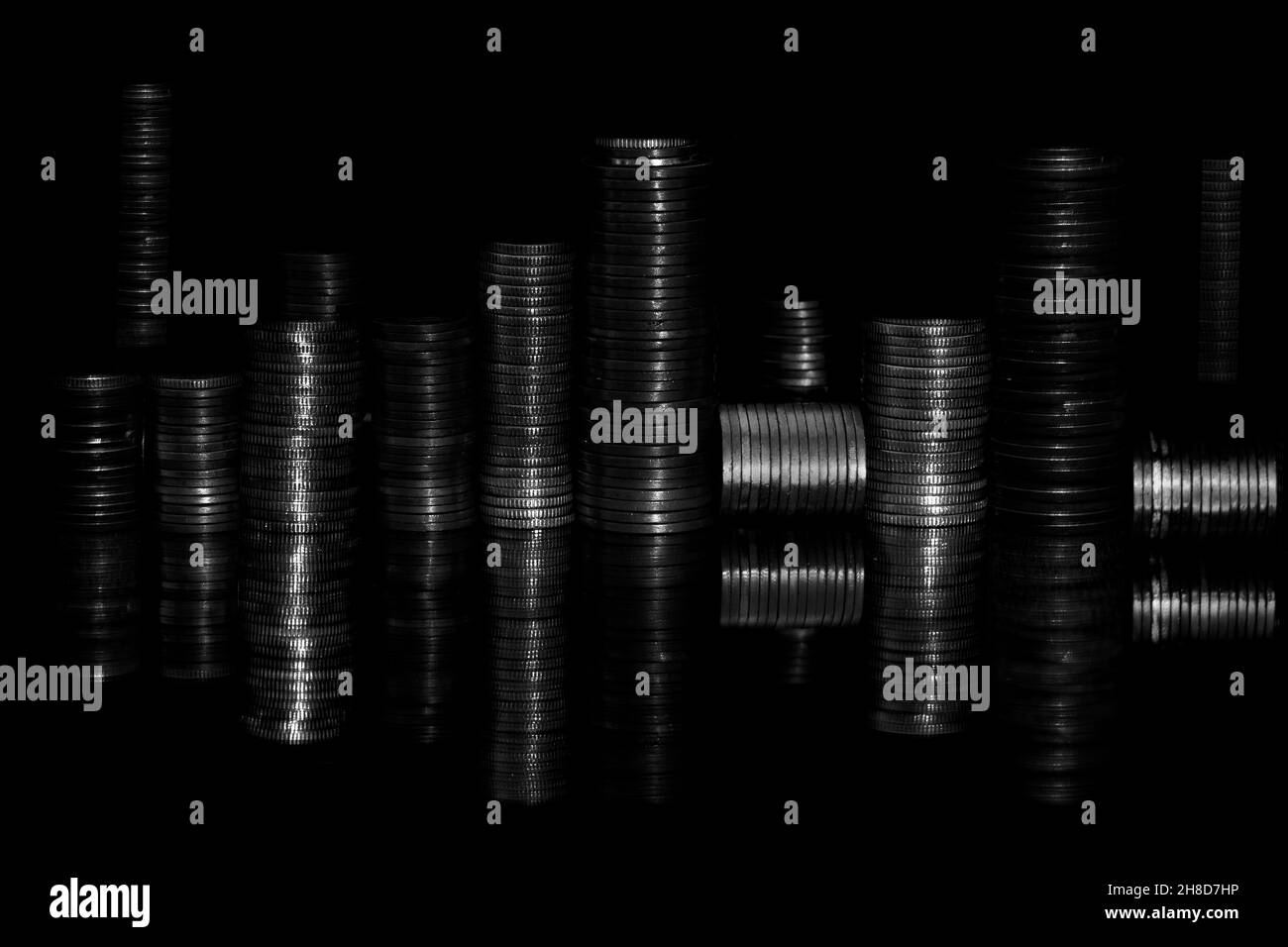 Des piles de pièces de monnaie ressemblant à des villes Banque D'Images