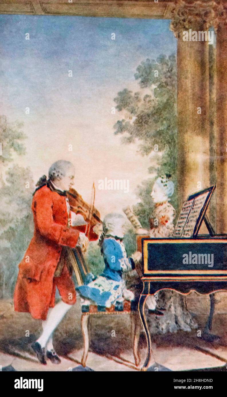 Mozart, 7 ans, au clavecin avec sa sœur Marianne et son père Johann.Après une aquarelle par L.C.Carmontelle, c.1763.Wolfgang Amadeus Mozart, 1756 – 1791, baptisé Johannes Chrysostomus Wolfgangus Theophilus Mozart.Compositeur prolifique et influent de la période classique.Johann Georg Leopold Mozart , 1719 – 1787.Compositeur allemand, chef d'orchestre, professeur de musique et violoniste.Maria Anna Walburga Ignatia Mozart, 1751 – 1829, appelée « Marianne » et surnommée Nannerl.Musicien.De l'âge d'or de Vienne, publié en 1948. Banque D'Images