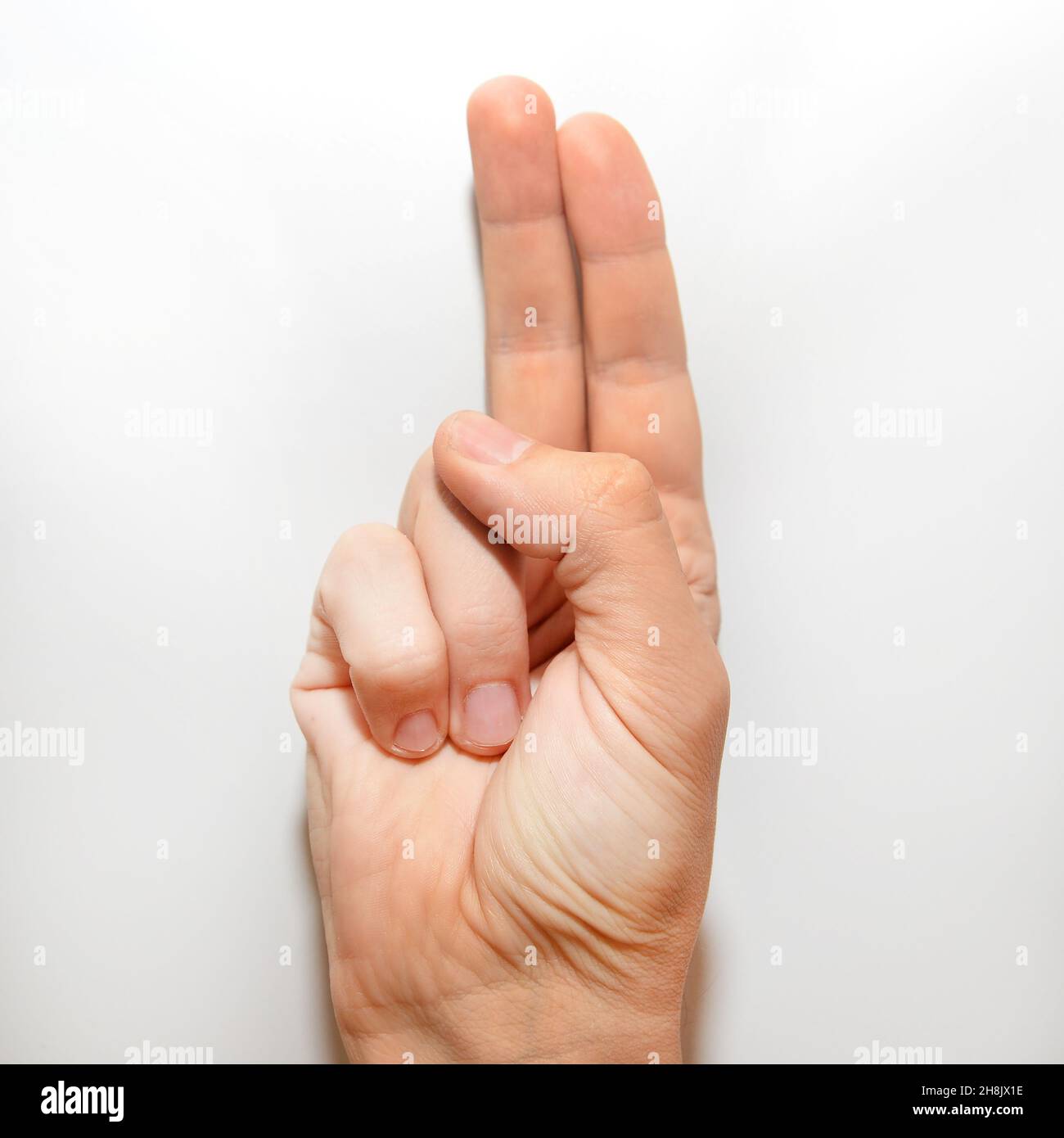 Lettre U en American Sign Language (ASL) pour les personnes sourdes Banque D'Images
