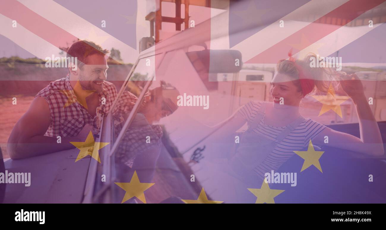 Image composite numérique de l'Union européenne et drapeau britannique sur couple romantique en véhicule Banque D'Images