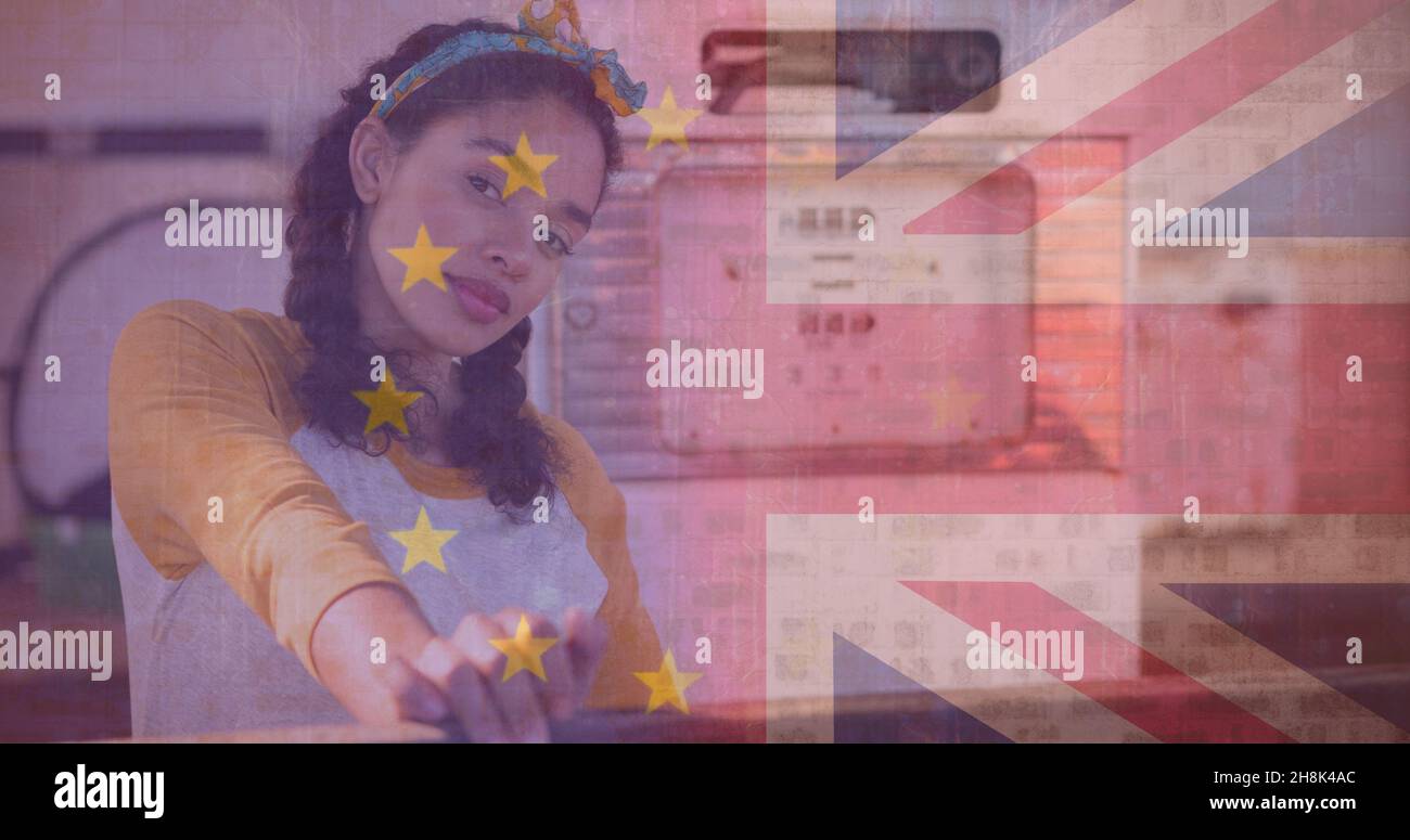 Image numérique composite de la jeune femme à la station-service avec l'Union européenne et le drapeau britannique Banque D'Images