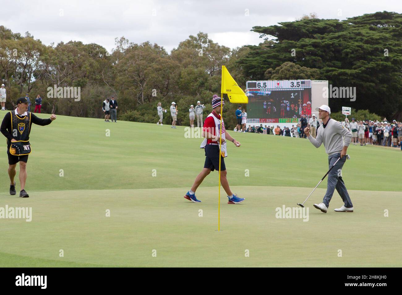 Adam Scott d'Australie célèbre après avoir coulé son putt birdie sur 11ème vert pendant la ronde 3 de la coupe des présidents crédit: Speed Media/Alamy Live News Banque D'Images