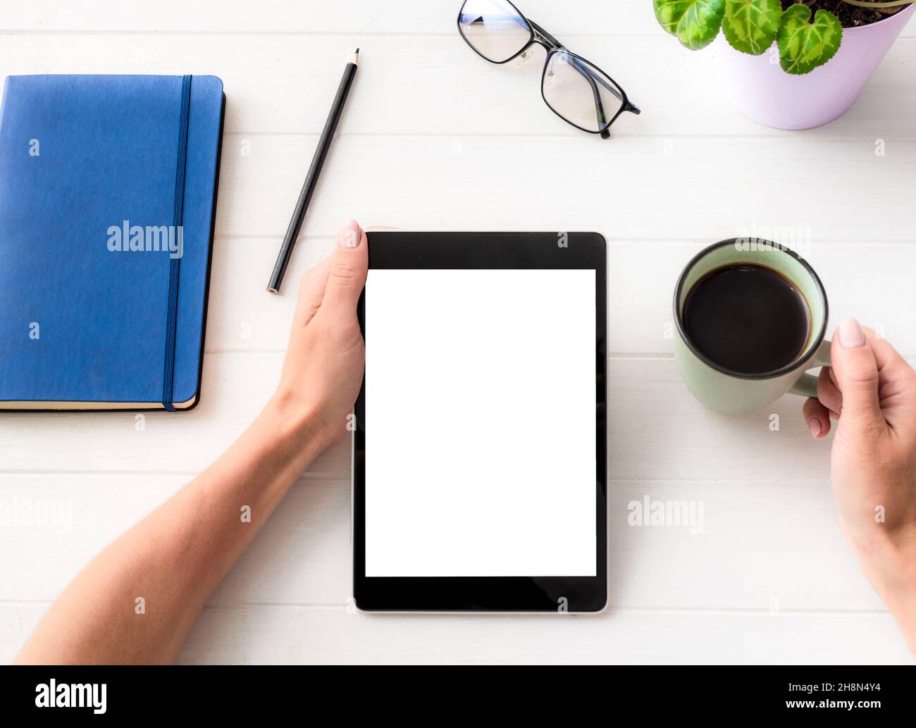 Vue du dessus de la tablette de maintien et du mug à café pour fille Banque D'Images