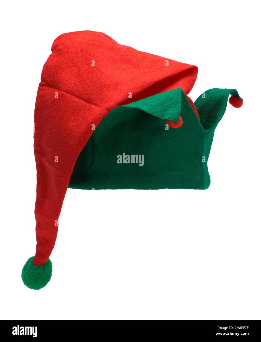 Chapeau Elf rouge et vert en feutre découpé. Banque D'Images