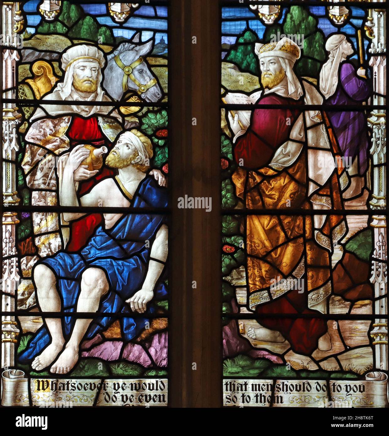 Un vitrail de Robert Newbery représentant le bon Samaritain, l'église St Mary's, Usk, Monbucshire Banque D'Images