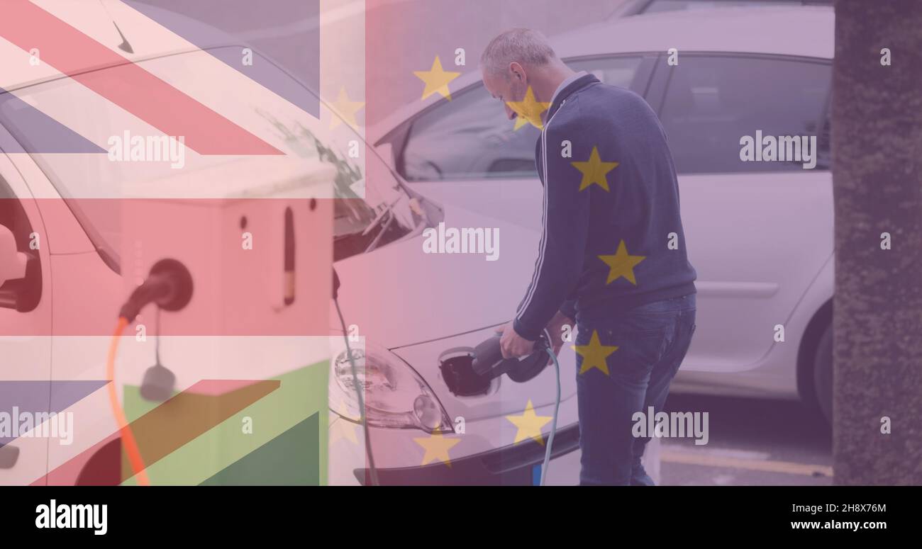 Composite numérique de l'homme qui charge la voiture électrique à la station avec l'Union européenne et le drapeau britannique Banque D'Images
