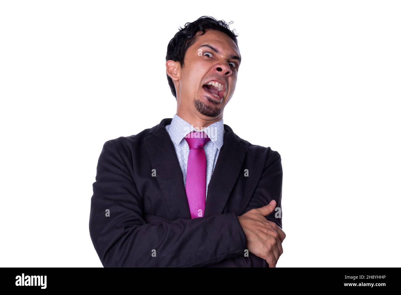 Homme d'affaires avec un regard méchant et un rire méchant, isolé sur un fond blanc. Banque D'Images Homme d'affaires avec un regard méchant et un rire méchant, isolé sur un fond blanc. Banque D'Images