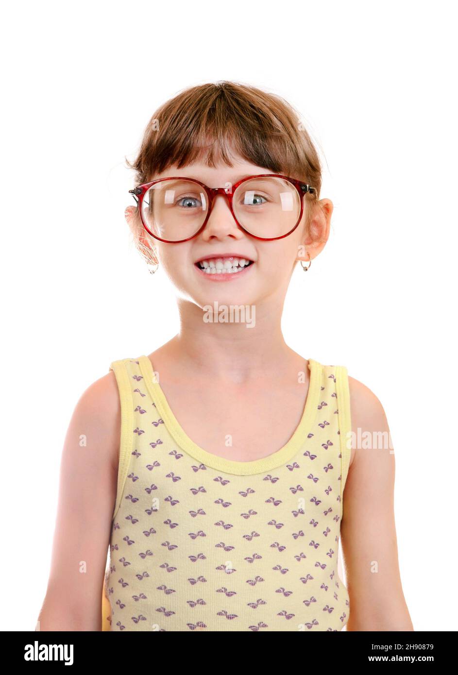 Petite fille dans les lunettes isolé sur le fond blanc Banque D'Images