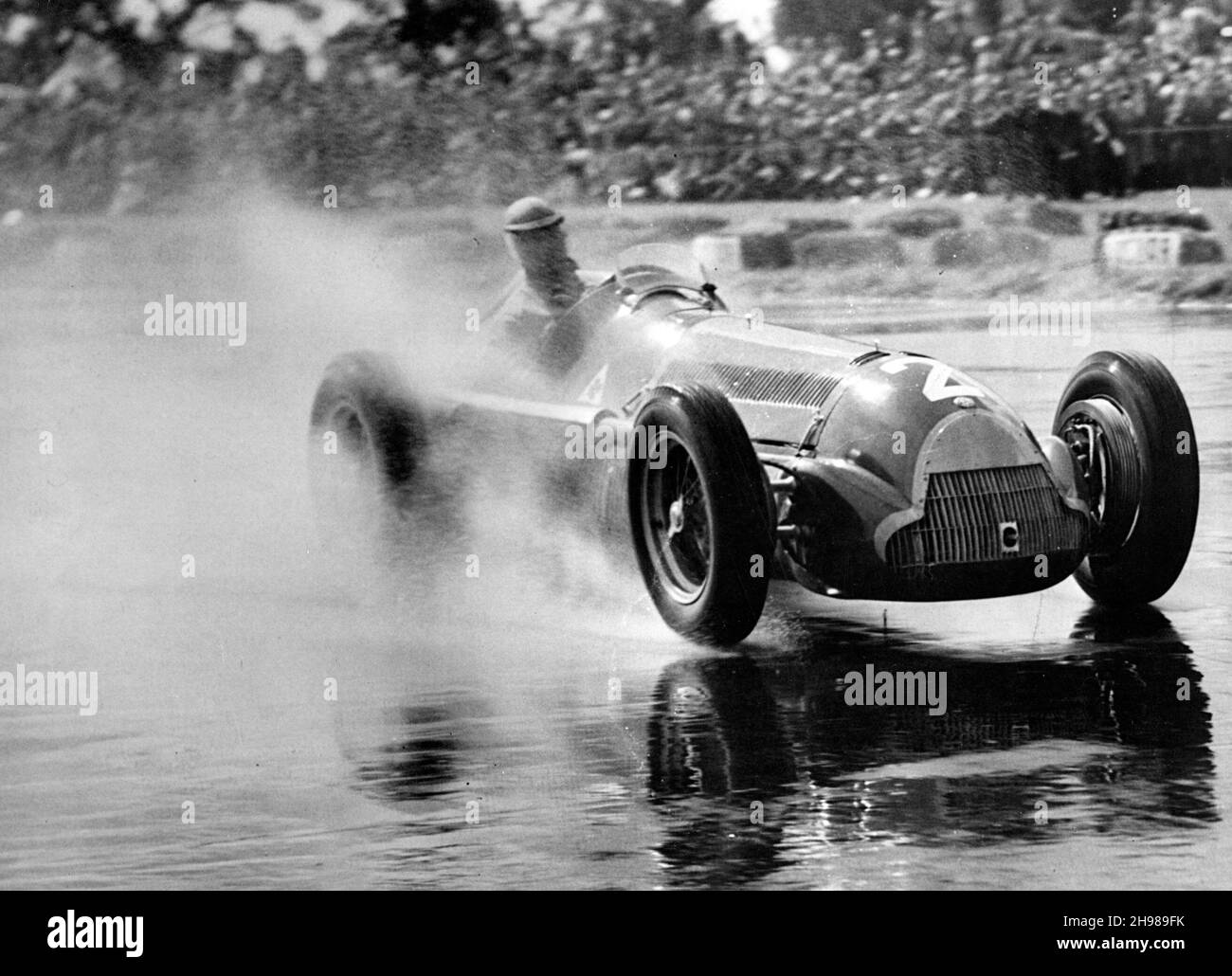 Juan Manuel Fangio, pilote de course argentin, volant d'un Alfa Romeo 158 1950 dans le Trophée international de Silverstone. Banque D'Images