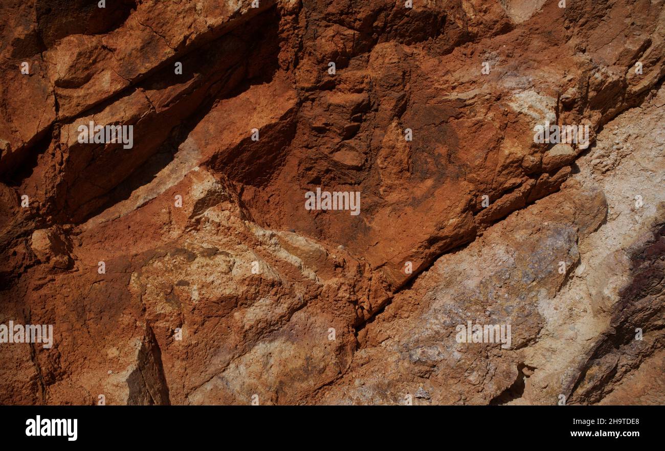 arrière-plan en pierre aux teintes rougeâtres, gros plan Banque D'Images