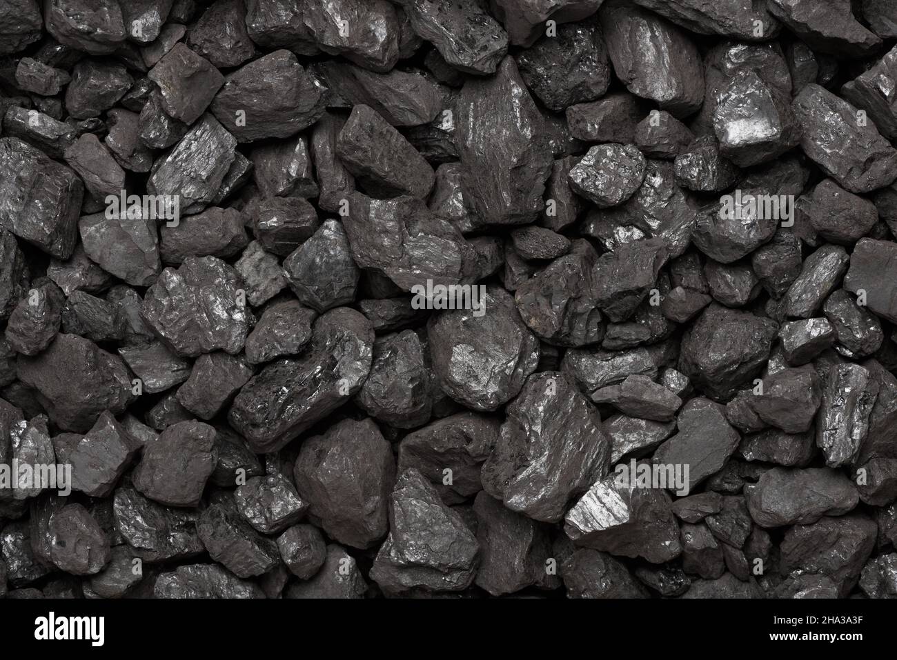 Vue de dessus texture charbon.Fond noir naturel en pierre de charbon. Banque D'Images