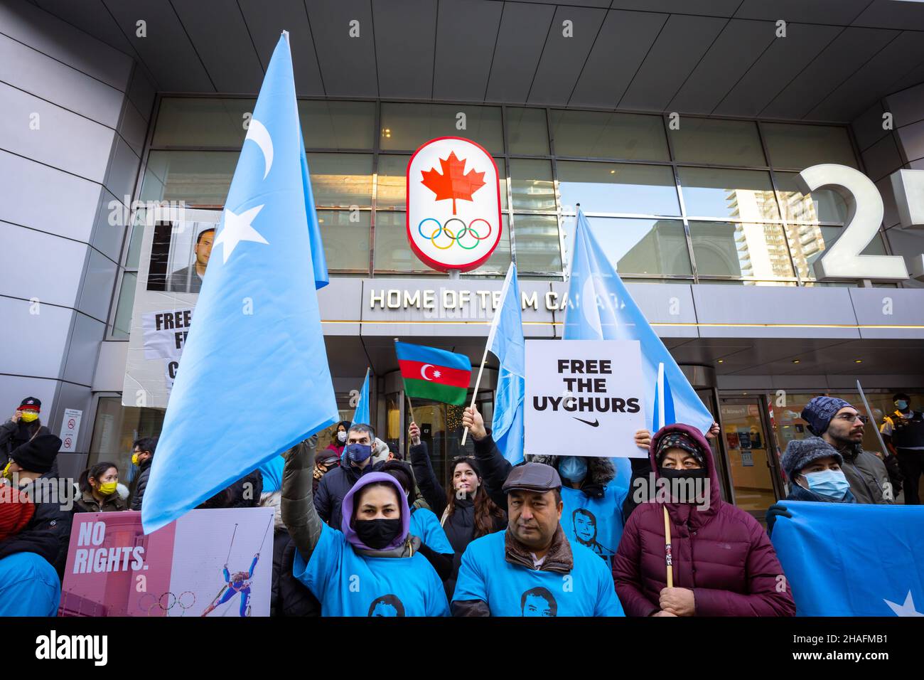 Les membres de la communauté uyghur demandent le boycott des Jeux olympiques d'hiver à Beijing en dehors du Comité olympique canadien à Toronto, en Ontario. Banque D'Images