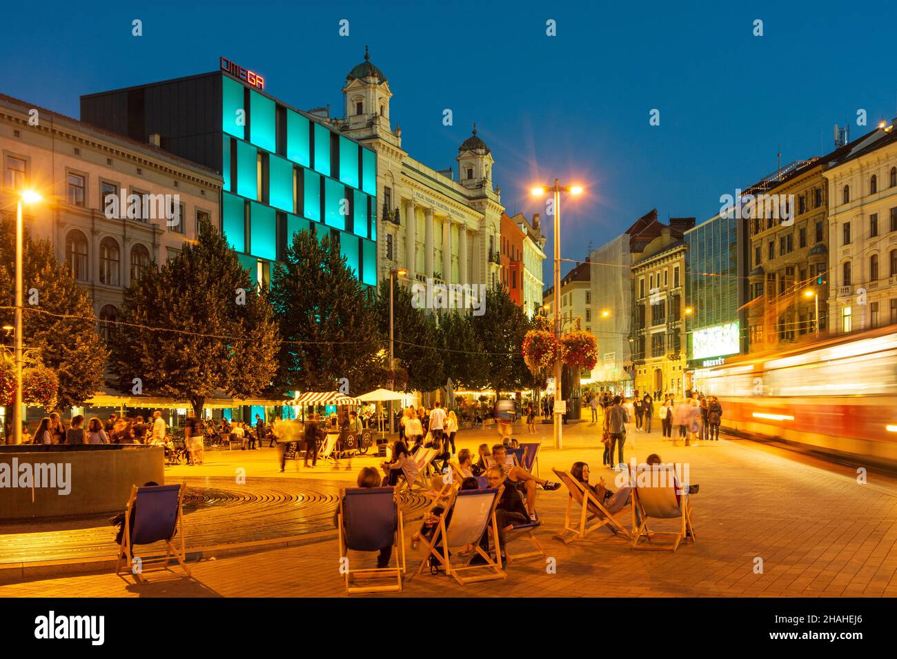 Personnes en chaises longues Banque de photographies et d’images à