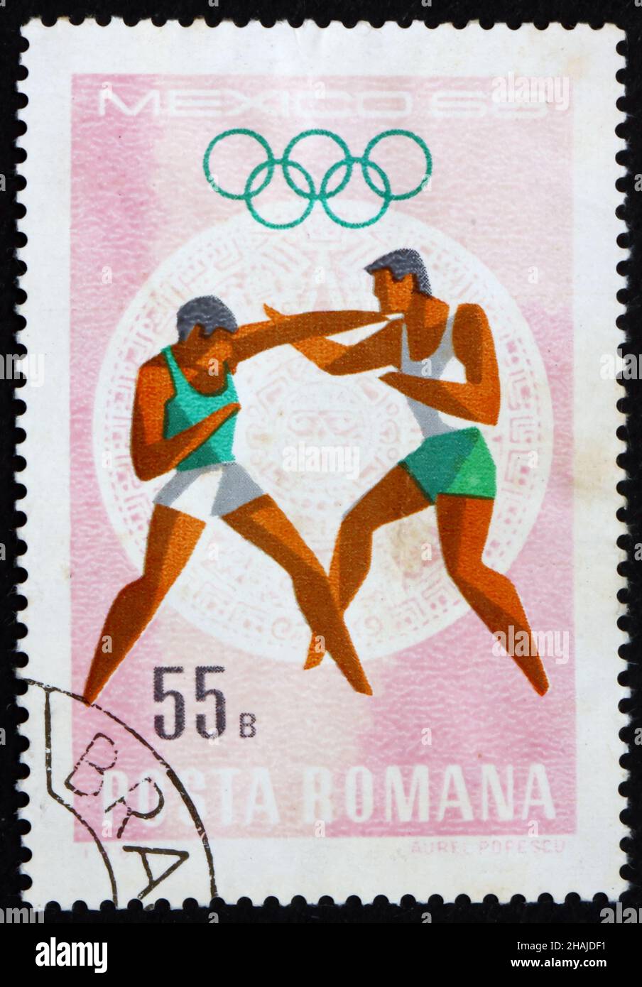 ROUMANIE - VERS 1968 : un timbre imprimé en Roumanie montre le Boxing, sports olympiques d'été, Mexique 68, vers 1968 Banque D'Images