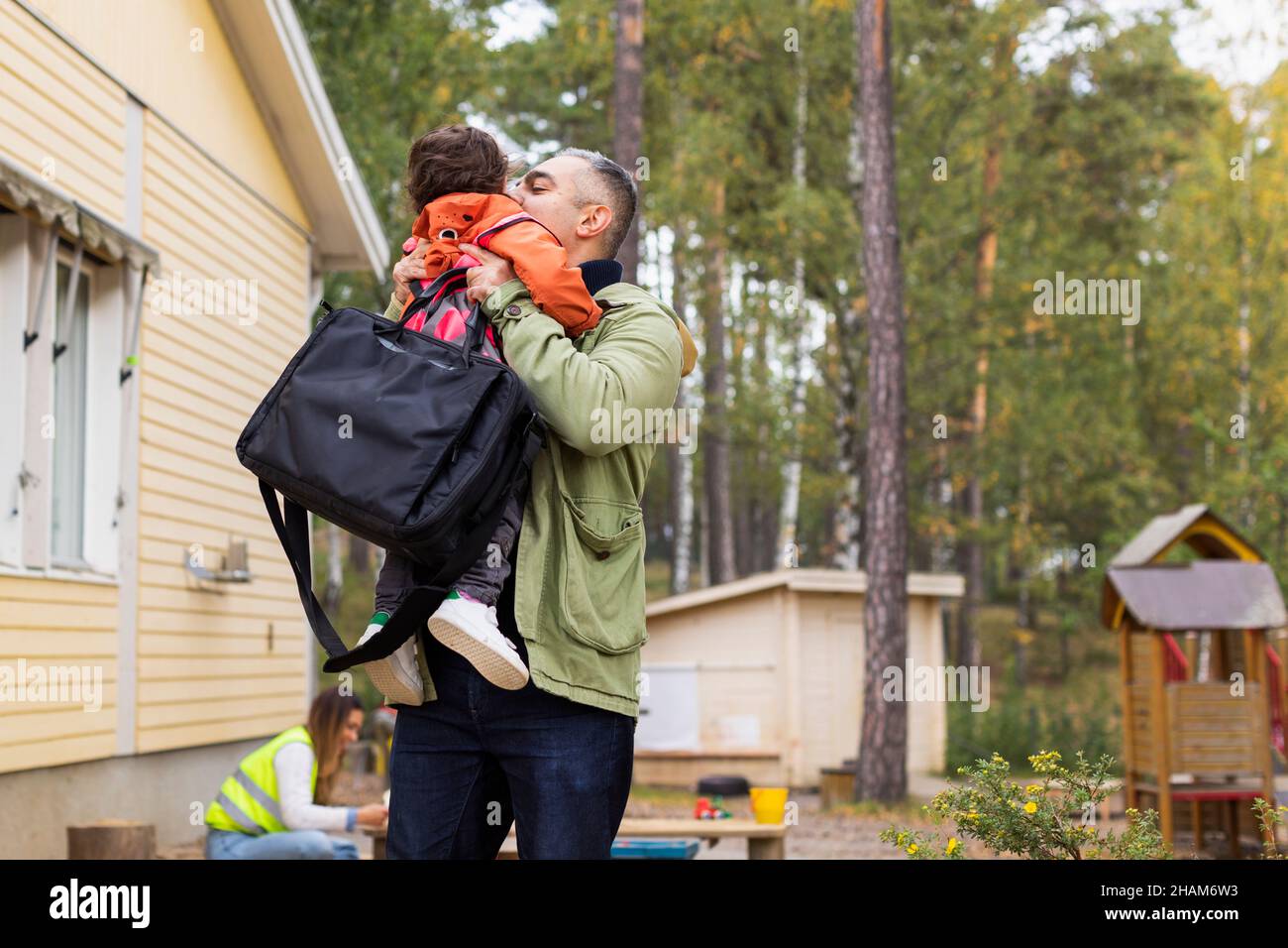 Père de collecte de fils de l'école Banque D'Images