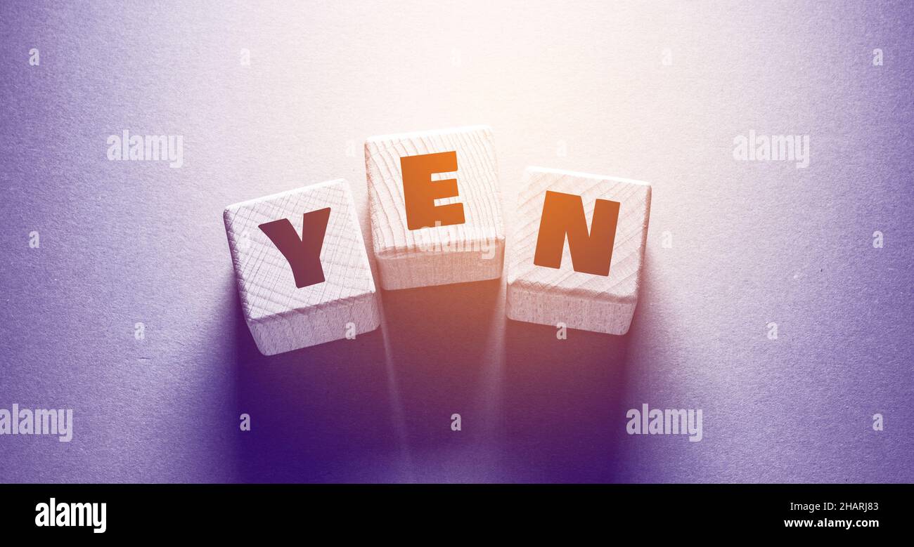 Yen Word écrit sur des cubes en bois Banque D'Images