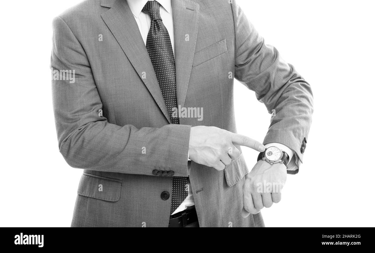 court homme d'affaires pointant du doigt sur la montre à main. code vestimentaire professionnel. Banque D'Images