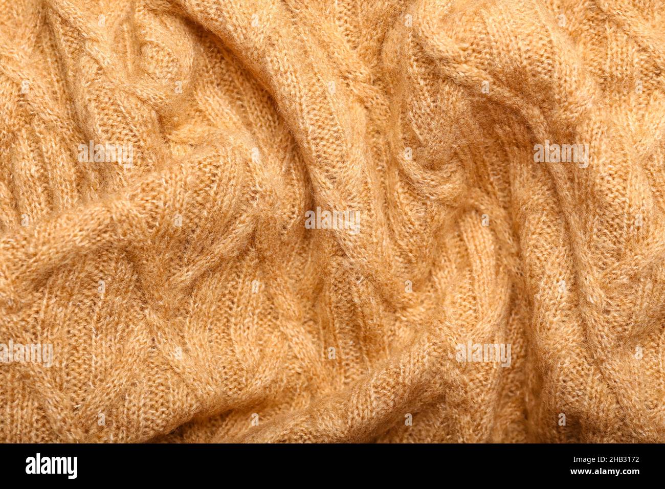 Texture du tissu tricoté froissé comme arrière-plan Banque D'Images