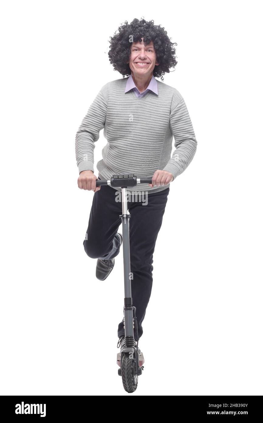 en pleine croissance. homme joyeux avec un scooter électrique. Banque D'Images