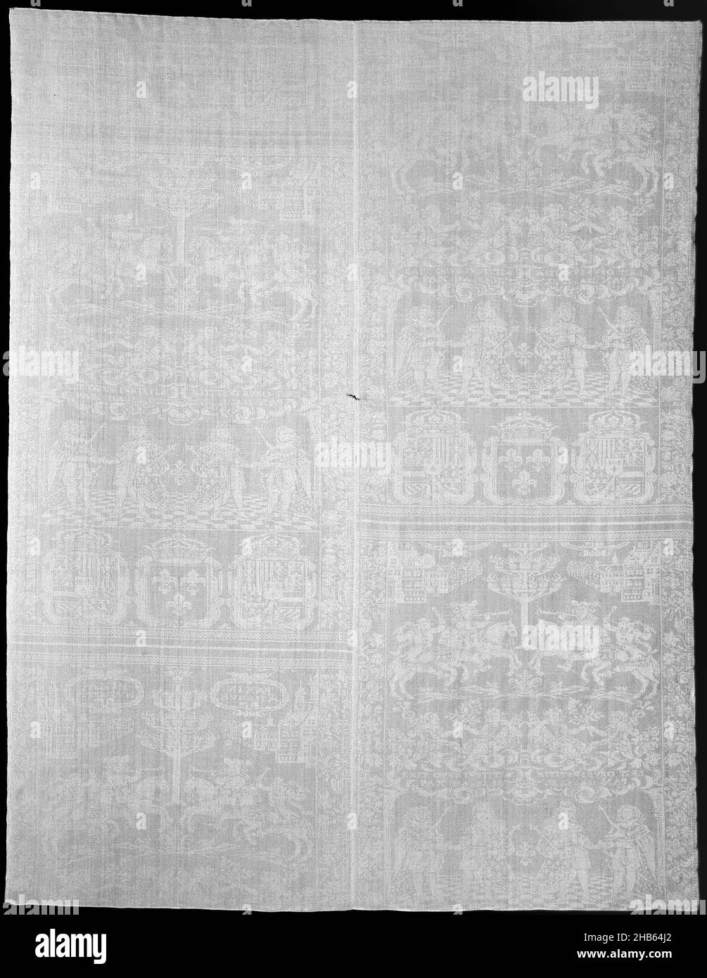 Lidservet avec représentation allusive d'une Alliance entre Louis XIV et Philippe V, Lidservet de blanc damask avec représentation allusive de la paix de Rastadt, 1714.En dessous l'un de l'autre, un modèle répété en miroir de: 1. Un tambourin monté avec Pax sur la selle avec un timbaste derrière lui; 2.L'empereur Charles VI avec le texte ci-dessous: ERIT OPUS IVSTITIAE/PAX ISA 52,17 (après Jezaiah 52,17: Le fruit de la justice sera la paix); 3.Les armoiries de Bourgogne (Espagne avec les armoiries de France dans le bouclier central).Bordures fleuries.Le bas gauche est brodé en rouge Banque D'Images