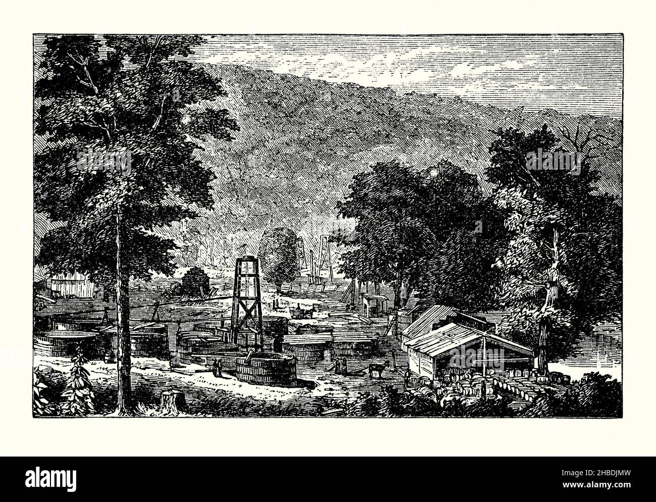 Une ancienne gravure de puits de pétrole sur Hyde et Egbert's Farm, Oil Creek, Pennsylvanie, Etats-Unis vers 1860.Il est tiré d'un livre victorien du 1890s sur les découvertes et les inventions pendant le 1800s.Les derricks en bois et les conteneurs pour l'huile sont au centre après que l'huile a été découverte le long de la vallée de la rivière Alleghany au nord de Pittsburg.La propriété d’Alexander Davidson finit par être la ferme Hyde et Egbert lorsque les deux frères Egbert ont mis un acompte sur la ferme en 1860.Alexander est mort et son épouse a négocié une douzième redevance pour le pétrole sur la ferme de 38 acres en 1862. Banque D'Images