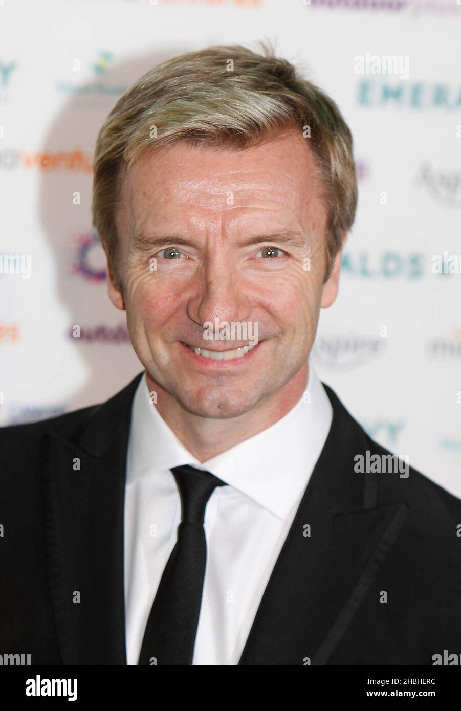 Christopher Dean arrive aux Emeralds et Ivy ball à Old Billingsgate à Londres. Banque D'Images