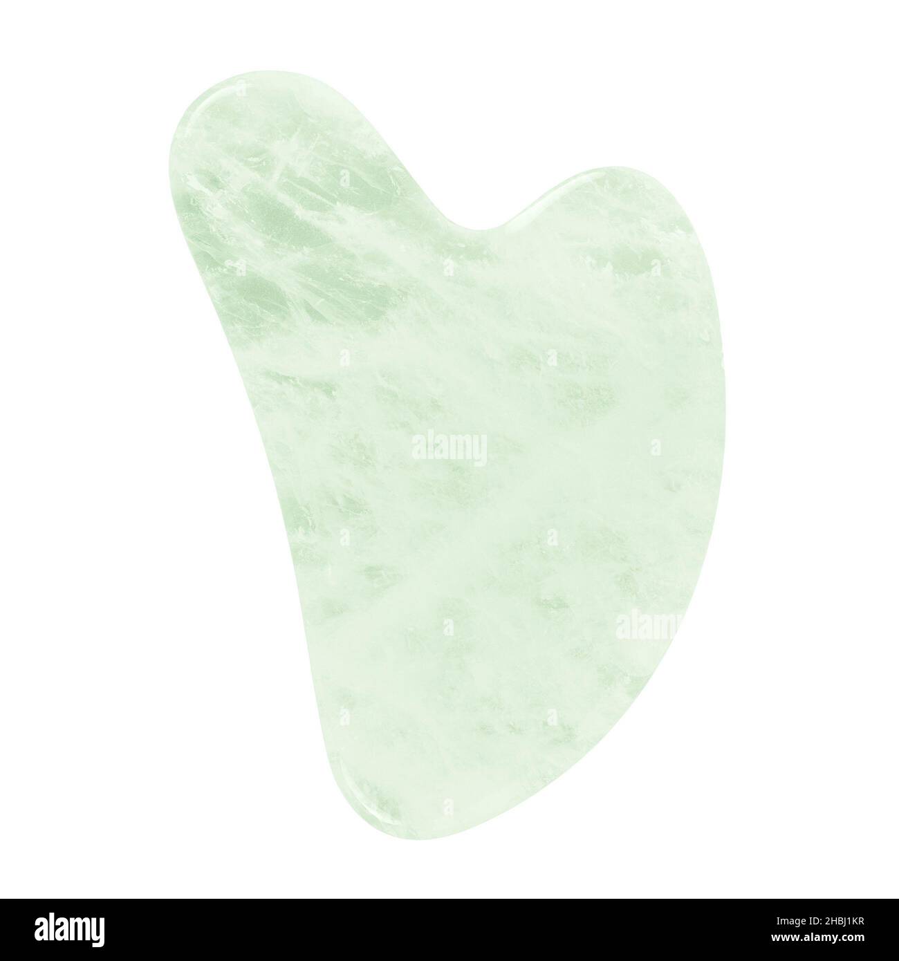 Grattoir Gua Sha vert, outil de massage isolé sur fond blanc. Banque D'Images