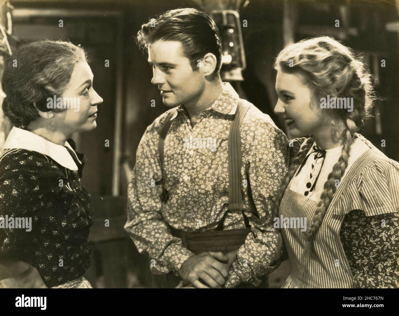 Les acteurs américains Alice Brady, Tom Brown et Mary June Story dans le film dans Old Chicago, USA 1937 Banque D'Images
