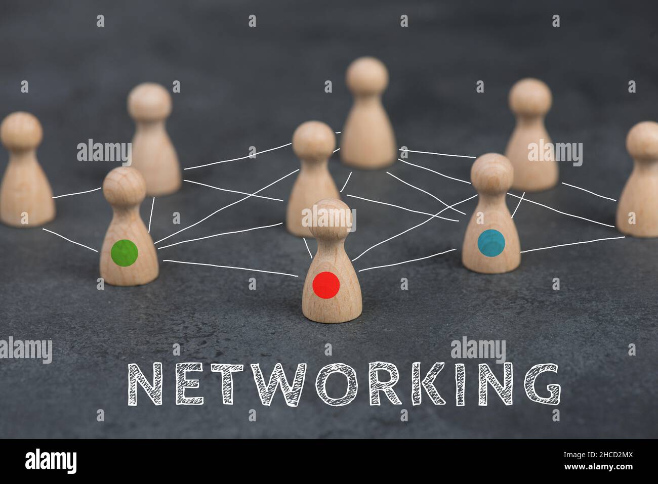 Figurines en bois, groupe de personnes se connectant par le biais d'un web, le réseautage d'affaires et le concept de communication, le leadership Banque D'Images