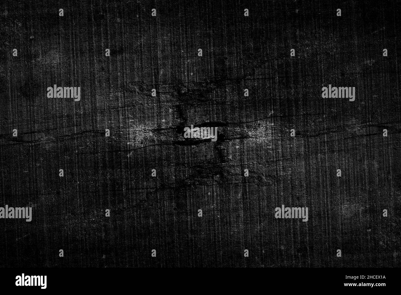 Surface en bois sombre craquelé avec texture grunge pour l'arrière-plan Banque D'Images