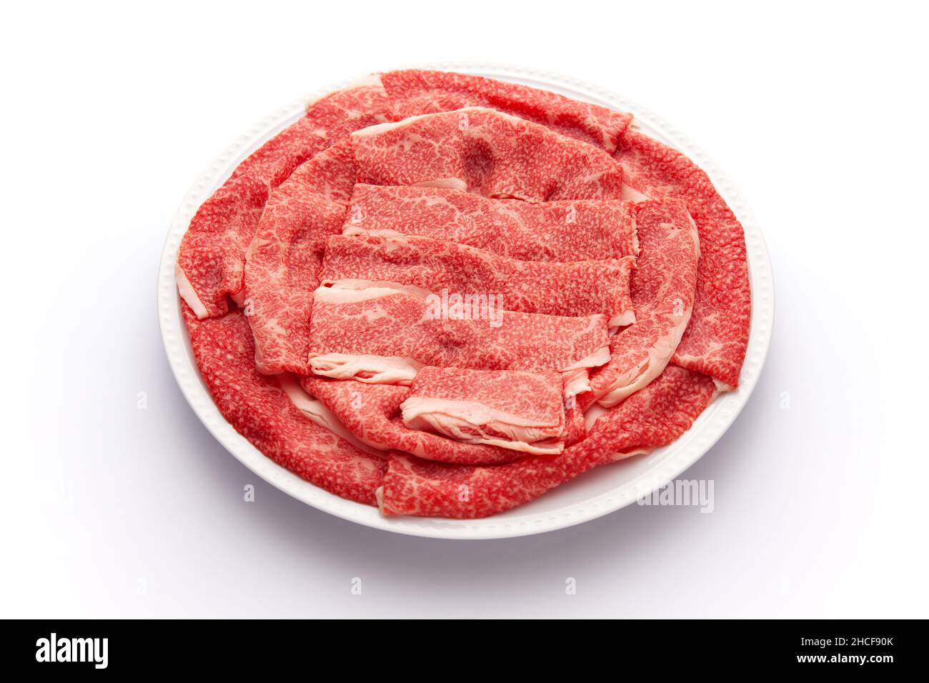 Viande de bœuf japonaise noire Wagyu crue isolée sur fond blanc Banque D'Images