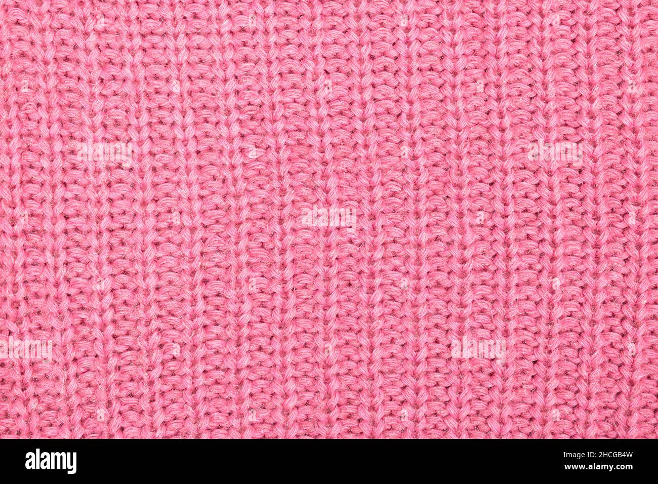 Texture de tissu tricoté rose Banque D'Images