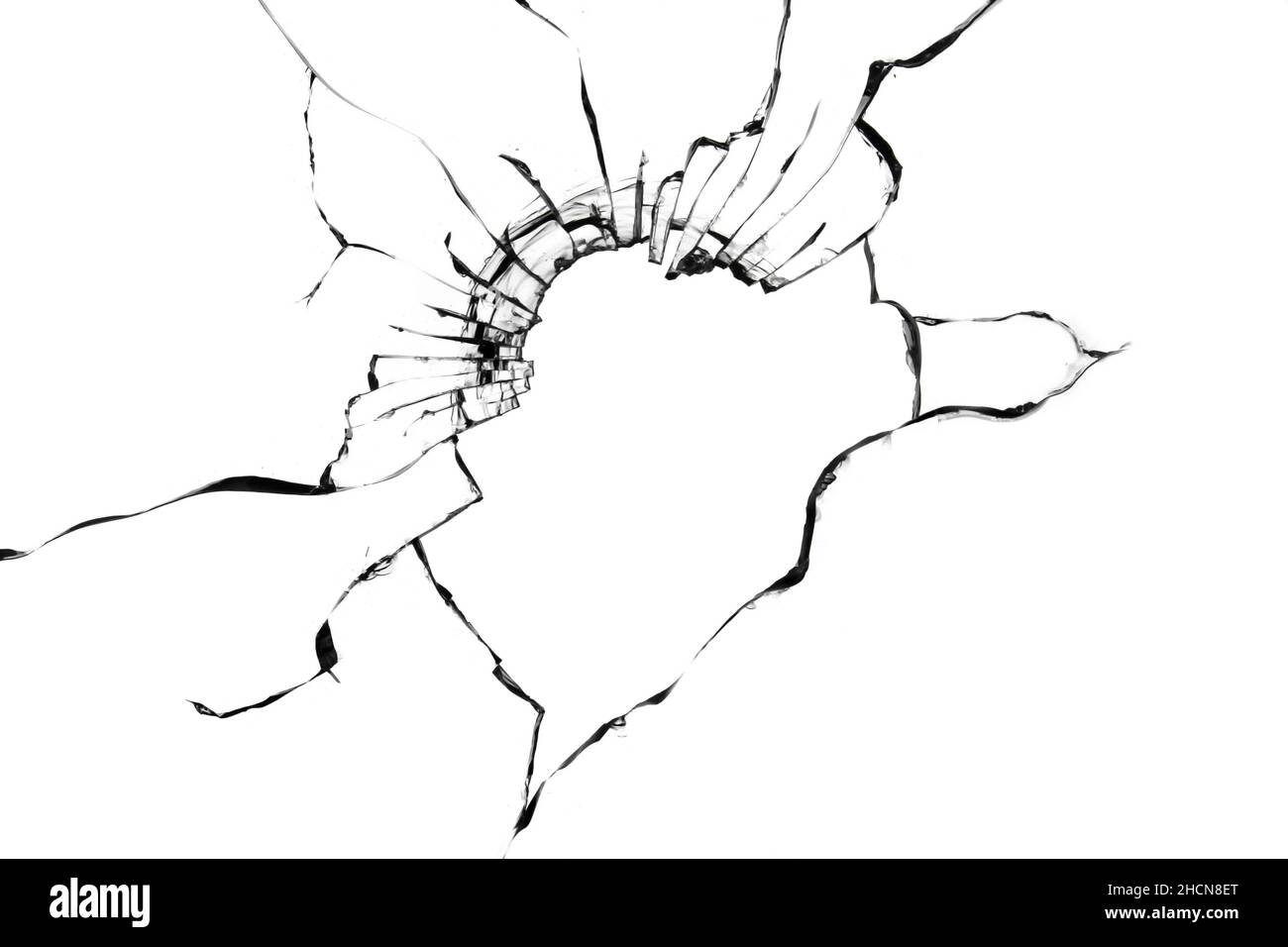 Texture de verre brisé sur fond blanc.Fissures noires d'une fenêtre cassée Banque D'Images