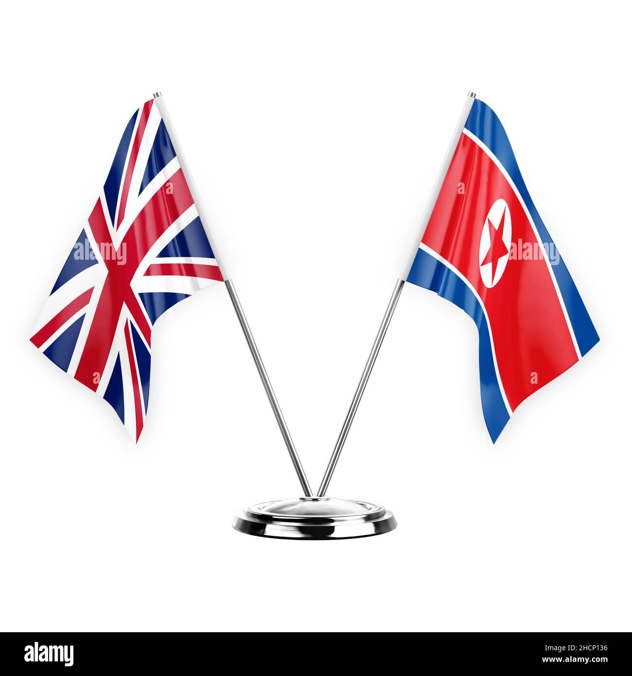 Deux drapeaux de table isolés sur fond blanc 3D illustration, royaume-uni et Corée du Nord Banque D'Images