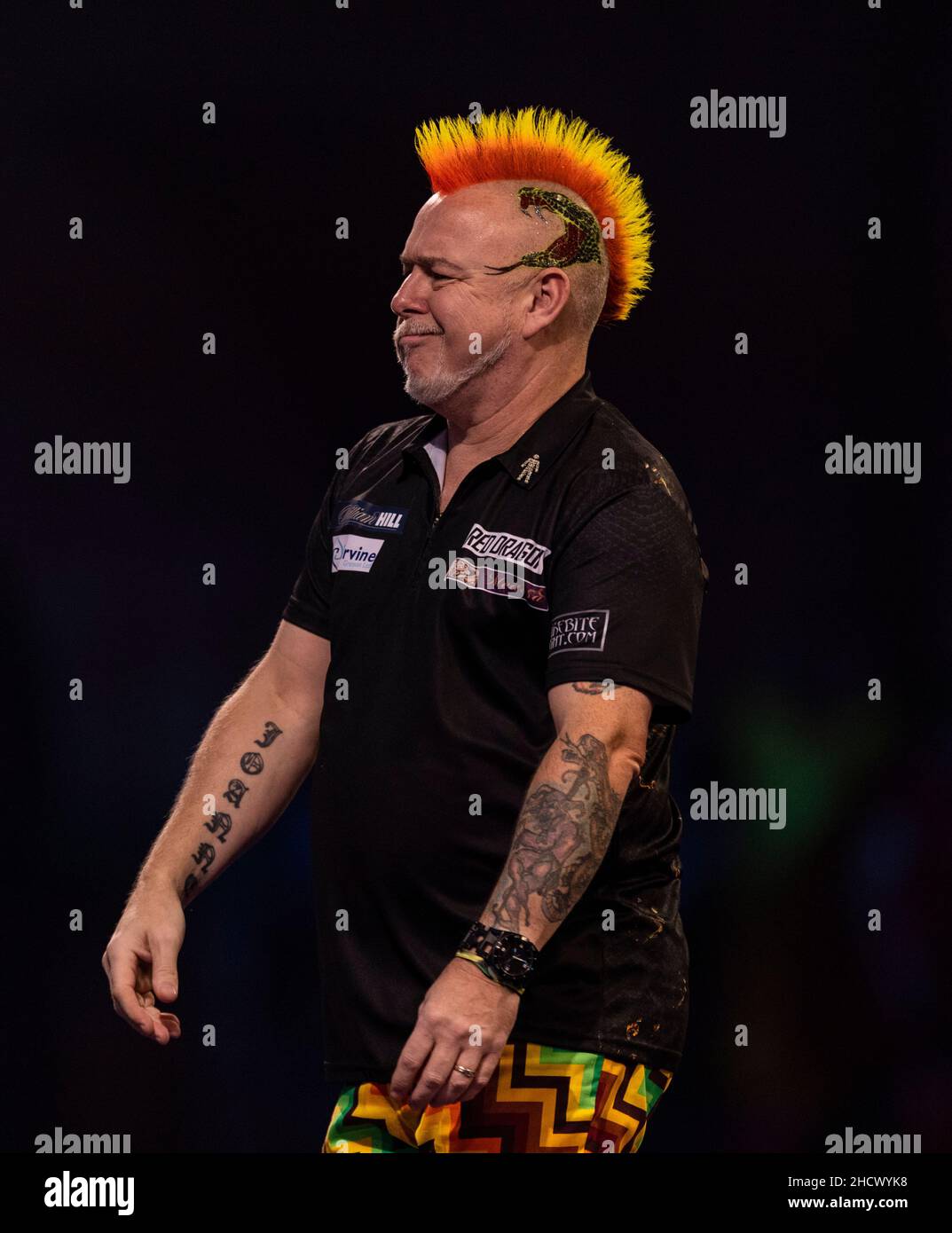 Peter Wright réagissant pendant le quatorze jour du Championnat du monde des fléchettes William Hill à Alexandra Palace, Londres.Date de la photo: Samedi 1 janvier 2022. Banque D'Images