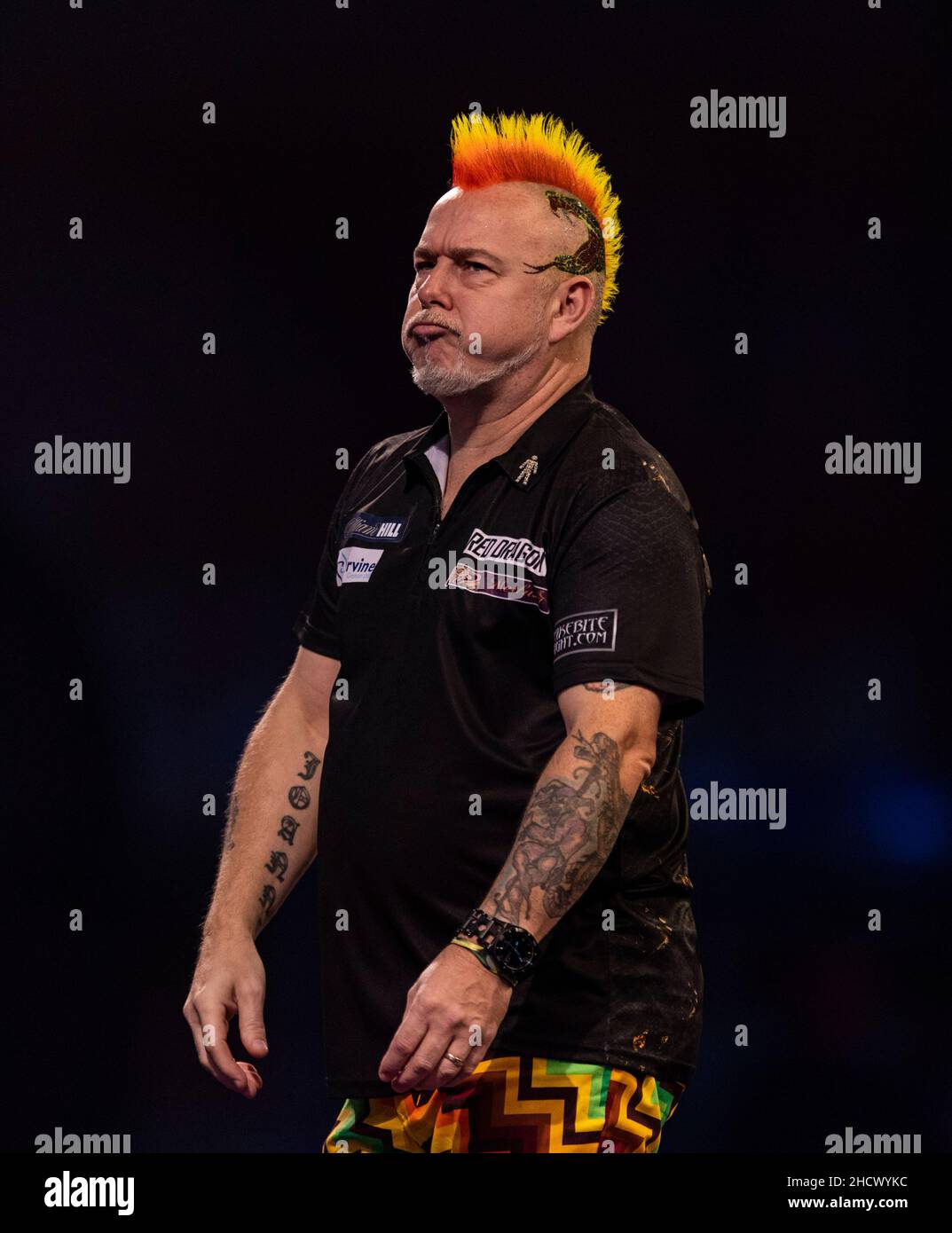 Peter Wright réagissant pendant le quatorze jour du Championnat du monde des fléchettes William Hill à Alexandra Palace, Londres.Date de la photo: Samedi 1 janvier 2022. Banque D'Images