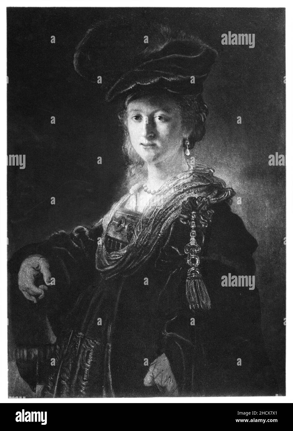 Rembrandt - demi-longueur d'une jeune femme dans le costume fantaisiste. Banque D'Images
