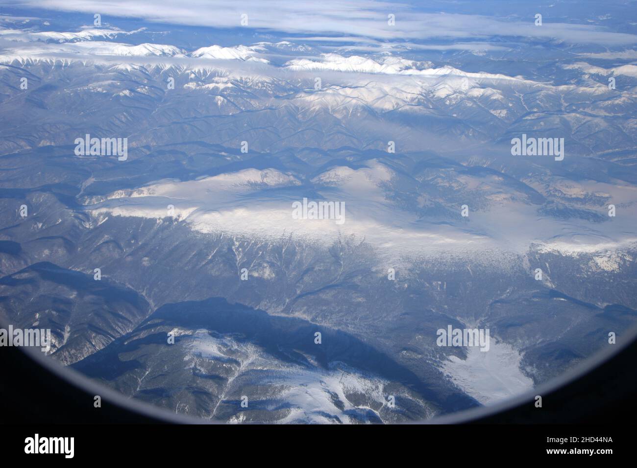 Mongolie sous la neige vue depuis un avion d'Air China Banque D'Images
